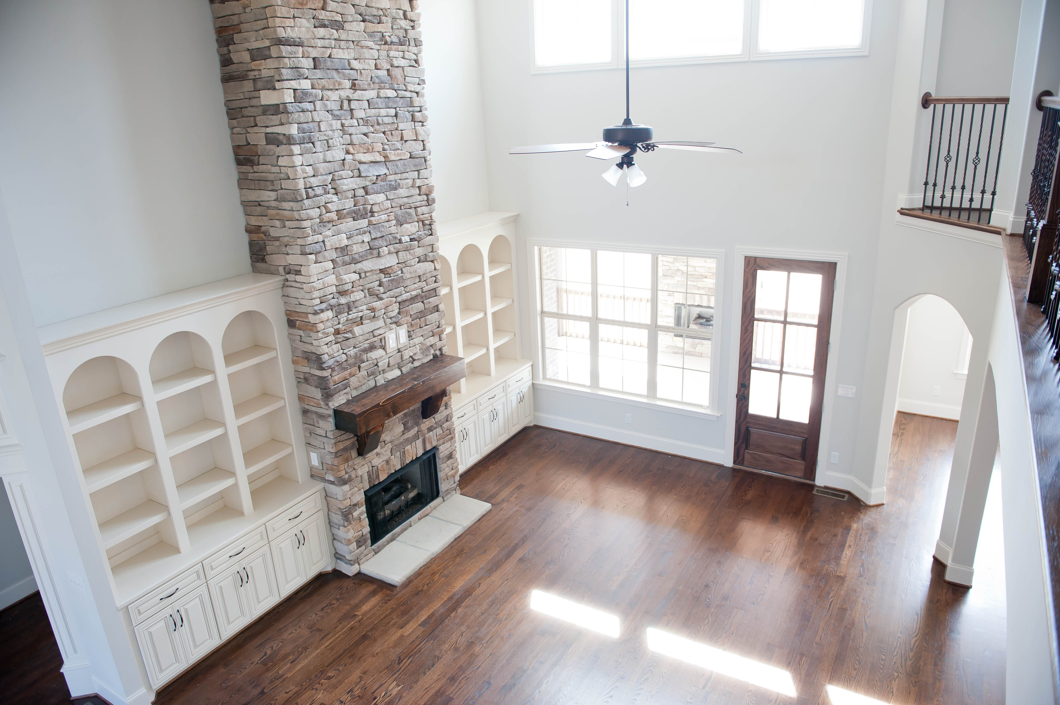 Stone Fireplace and Built In Shelving